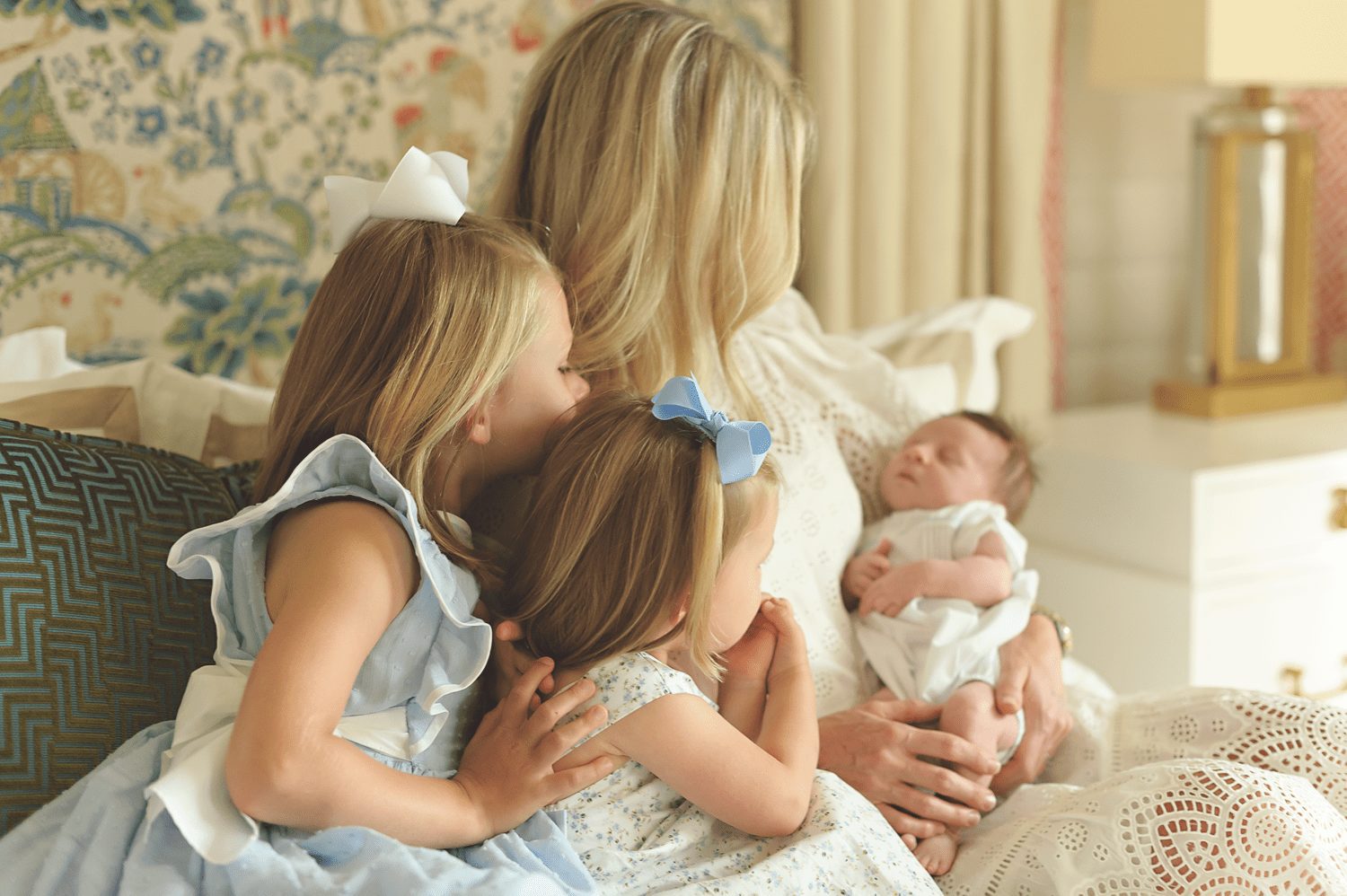 Mom with kids on bed