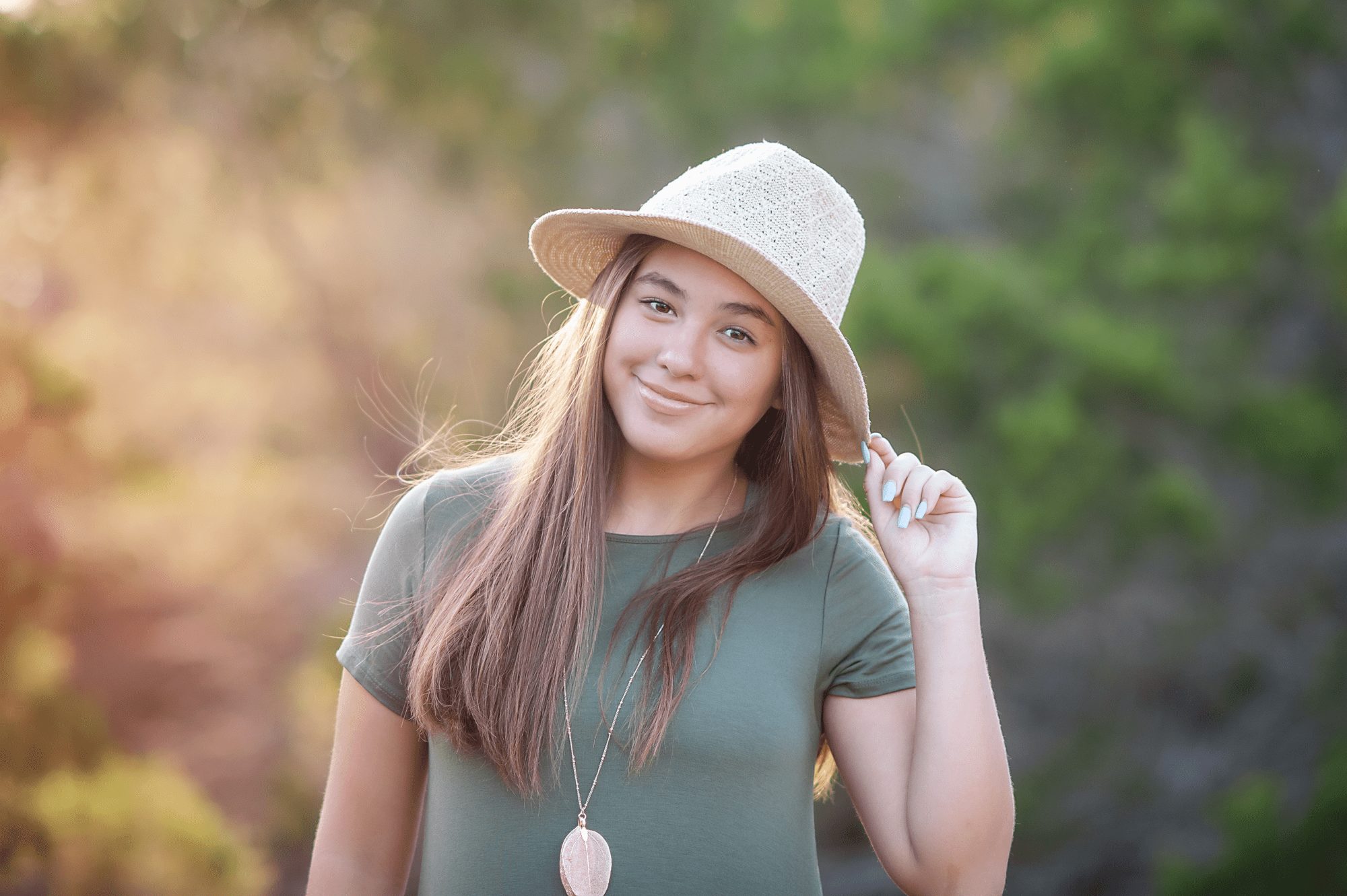 Teen with hat