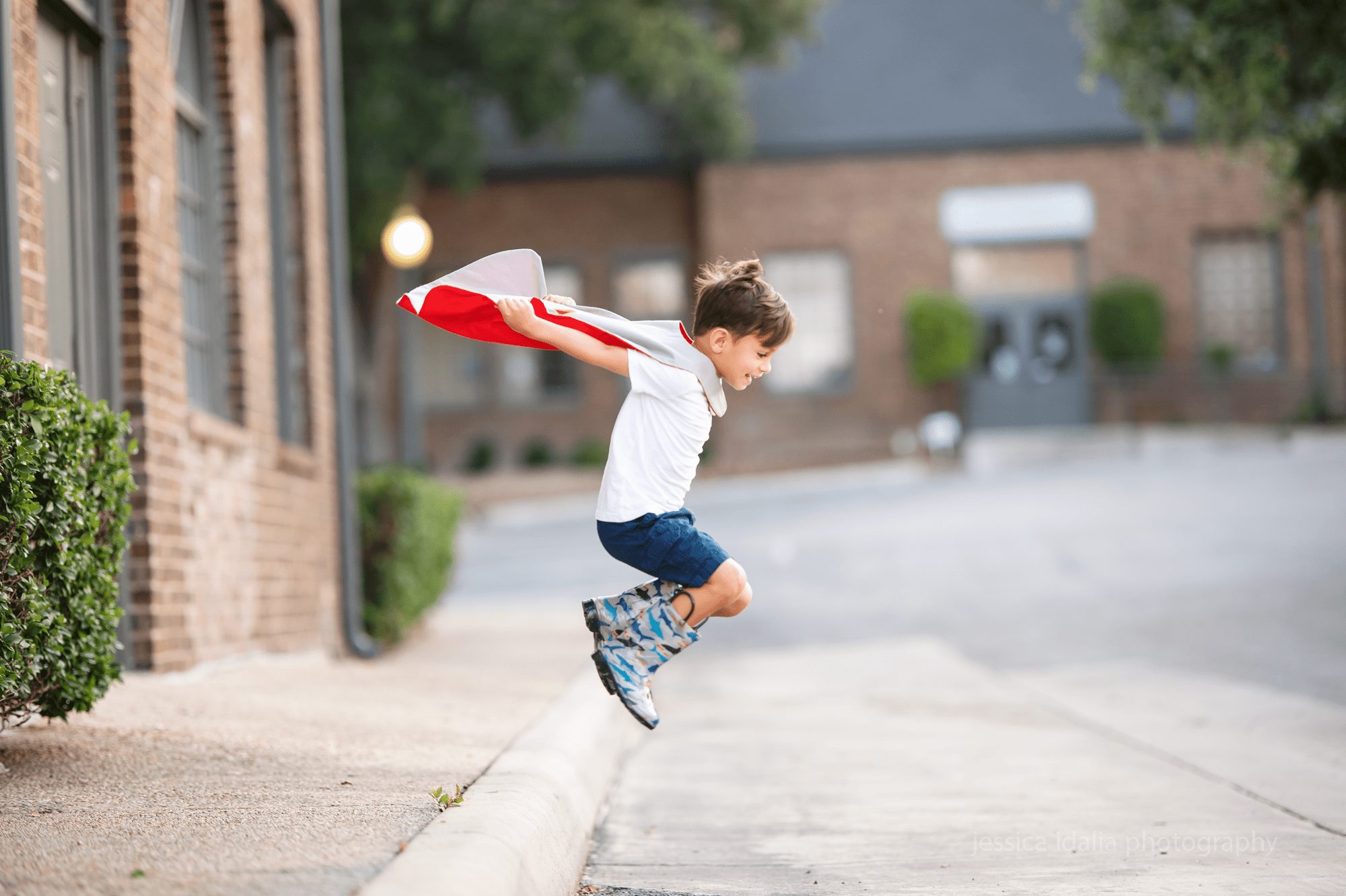 Boy with cape flying 