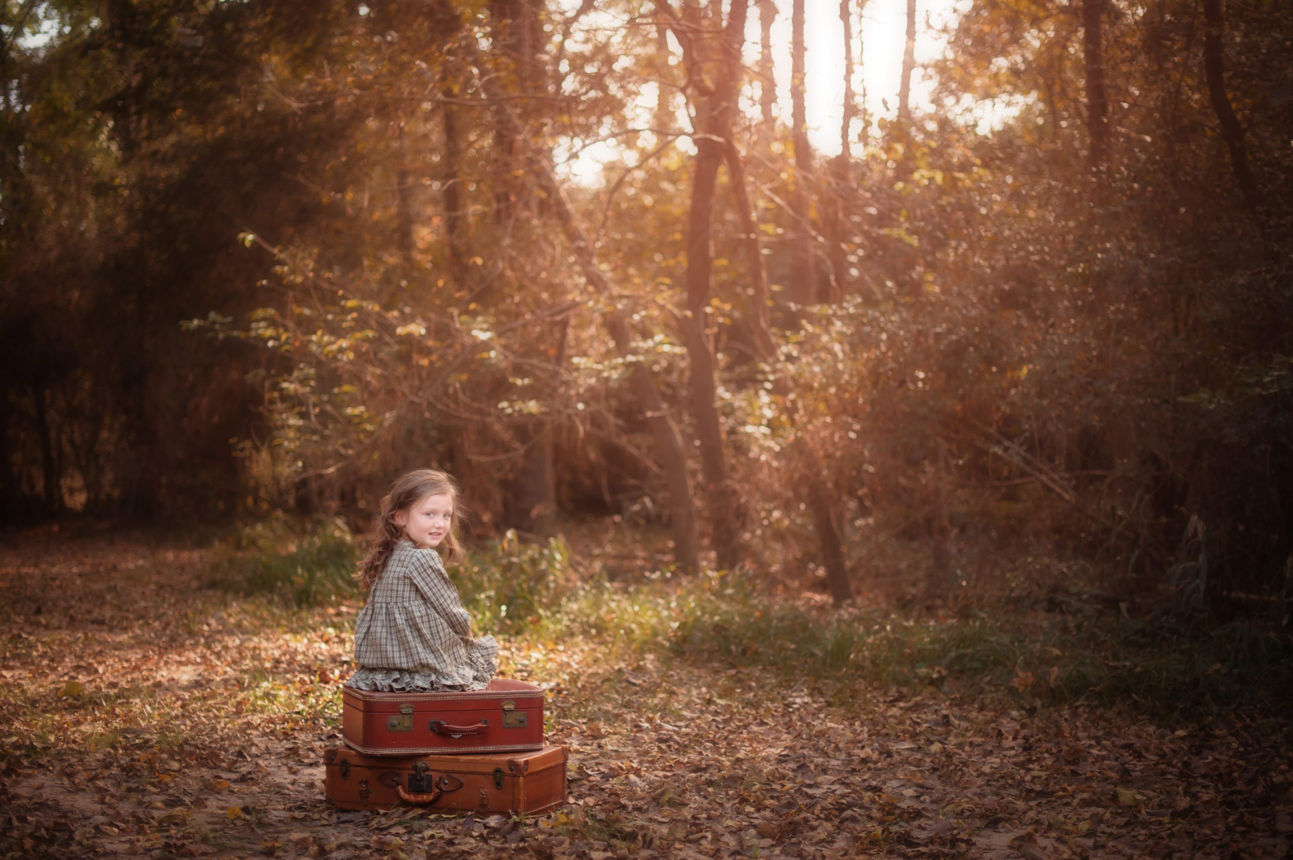 little girl with vintage suitcase photo